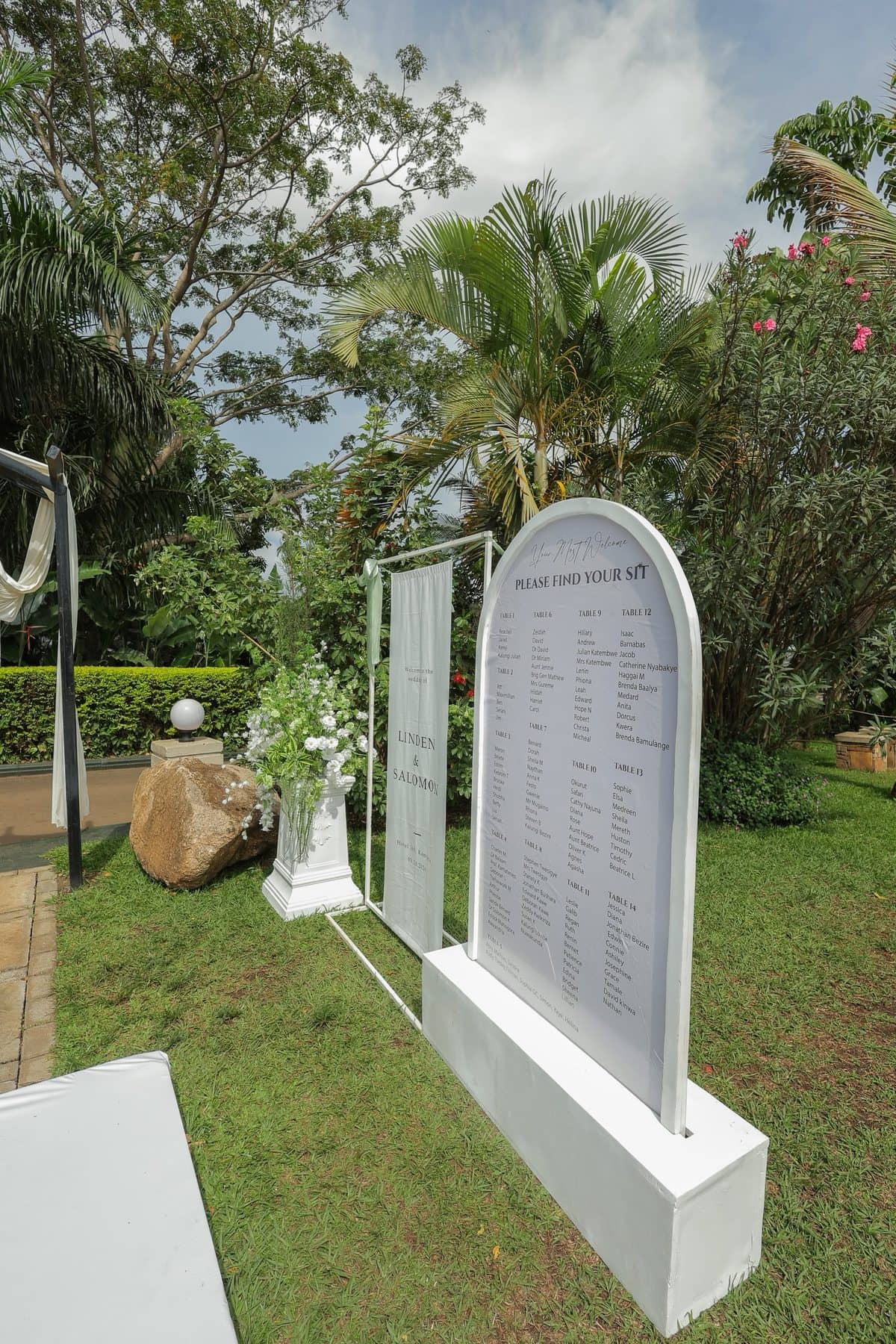 A welcome seating chart in the garden