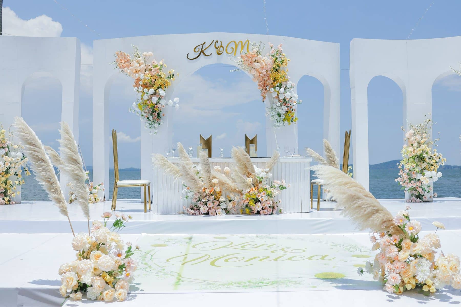 Sculpted frames finished with pampas and roses